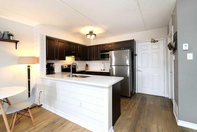 309 - 1487 Maple Ave, Condo with 2 bedrooms, 1 bathrooms and 1 parking in Milton ON | Image 27