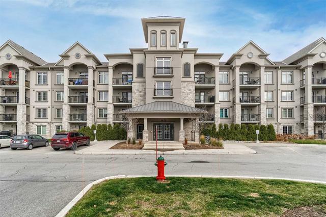 114 - 1470 Main St E, Condo with 2 bedrooms, 2 bathrooms and 1 parking in Milton ON | Card Image