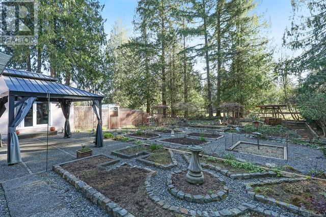 3406 Kentwood Rd, House detached with 3 bedrooms, 2 bathrooms and 4 parking in Comox Valley A BC | Image 44