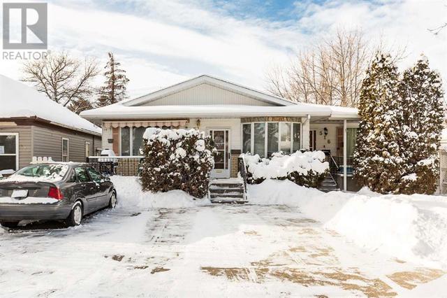 518 12 Street S, House semidetached with 4 bedrooms, 2 bathrooms and 4 parking in Lethbridge AB | Image 1