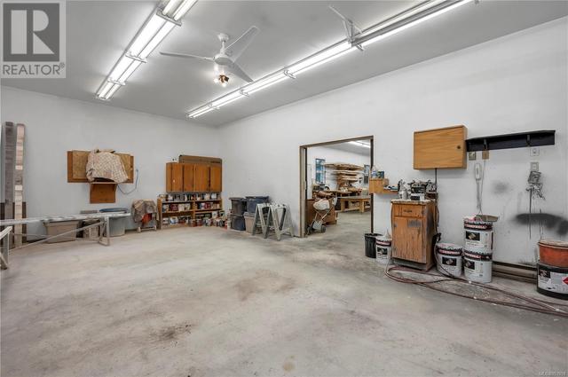 Workshop 30’ Wide x 70’ Long – 10’ Height •Fully Finished inside with 4 inch Concrete Slab Floor •Pro Lock Metal Roof  & Leaf Guard Gutters in Sept 2020 •WETT Certified Woodstove (Nov 2020) and | Image 82