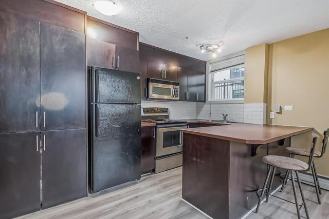 103 - 1333 13 Avenue Sw, Condo with 1 bedrooms, 1 bathrooms and null parking in Calgary AB | Image 2