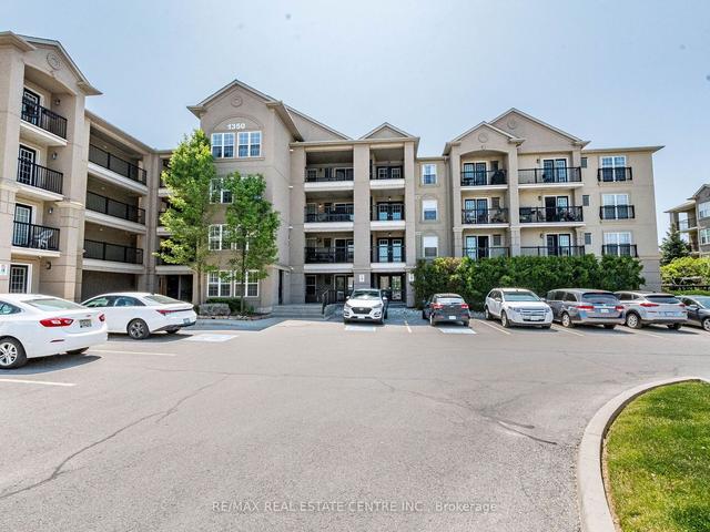 414 - 1350 Main St E, Condo with 2 bedrooms, 2 bathrooms and 2 parking in Milton ON | Image 1