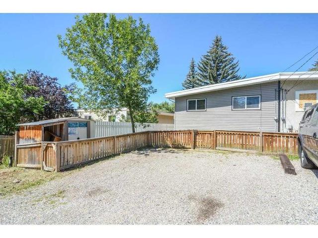 5834 Dalgleish Road Nw, Home with 5 bedrooms, 2 bathrooms and 2 parking in Calgary AB | Image 31