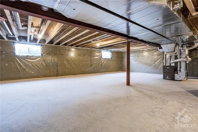 Basement with oversized windows and bathroom rough -in | Image 21