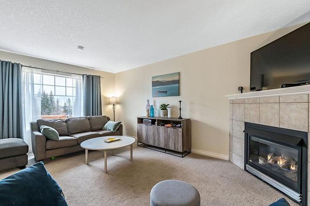 12 Crystal Shores Cove, Home with 2 bedrooms, 2 bathrooms and 2 parking in Calgary AB | Image 11
