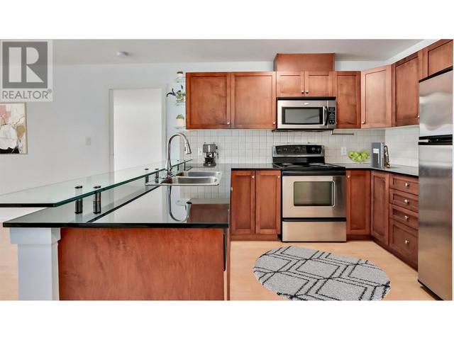 611 - 415 E Columbia Street, Condo with 2 bedrooms, 2 bathrooms and 2 parking in New Westminster BC | Image 3