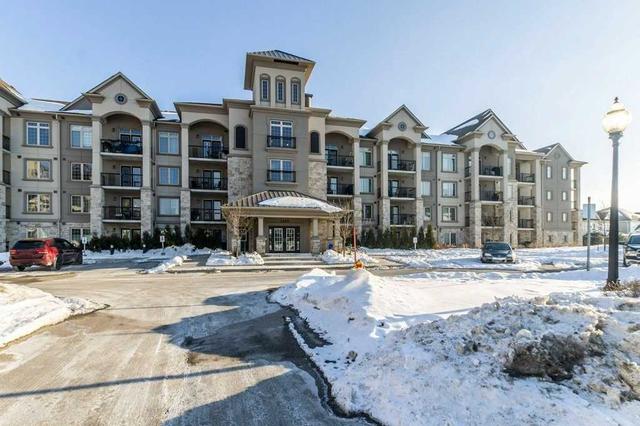 111 - 1470 Main St E, Condo with 2 bedrooms, 2 bathrooms and 1 parking in Milton ON | Image 1