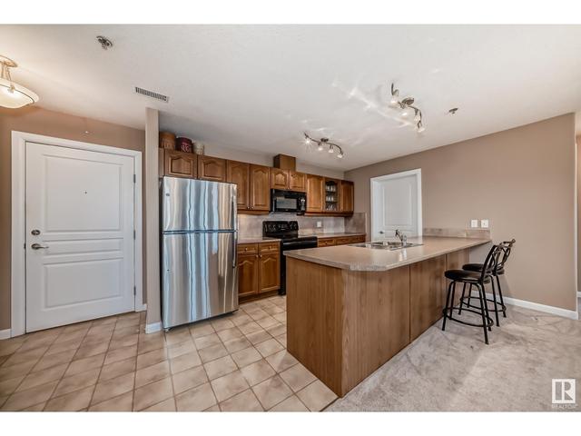 404 - 530 Hooke Road Nw Nw, Condo with 2 bedrooms, 2 bathrooms and 2 parking in Edmonton AB | Image 12