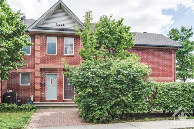 24 Maclean Street, Townhouse with 3 bedrooms, 2 bathrooms and 1 parking in Ottawa ON | Image 1