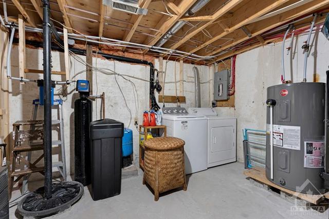 Combined laundry - utility room. | Image 24