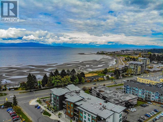 203 - 100 Lombardy St, Condo with 2 bedrooms, 2 bathrooms and 1 parking in Parksville BC | Card Image
