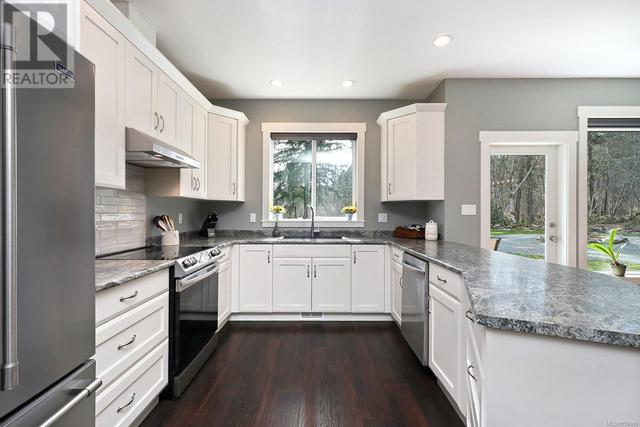 620 Elk Trail, House detached with 4 bedrooms, 2 bathrooms and 10 parking in Nanaimo F BC | Image 6