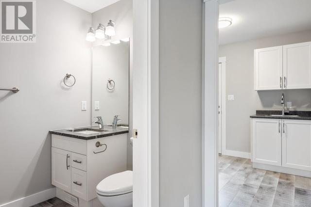 Downstairs powder room and laundry room | Image 14