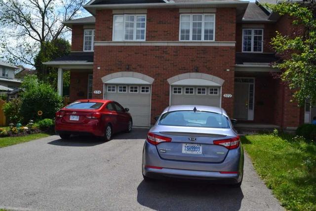 372 Berrigan Dr, House attached with 4 bedrooms, 3 bathrooms and 3 parking in Ottawa ON | Image 1