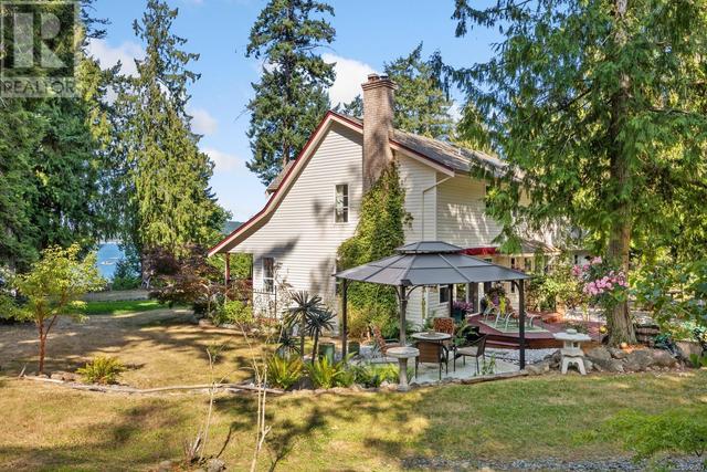 6249 Island Hwy, House detached with 3 bedrooms, 3 bathrooms and 8 parking in Comox Valley A BC | Image 65