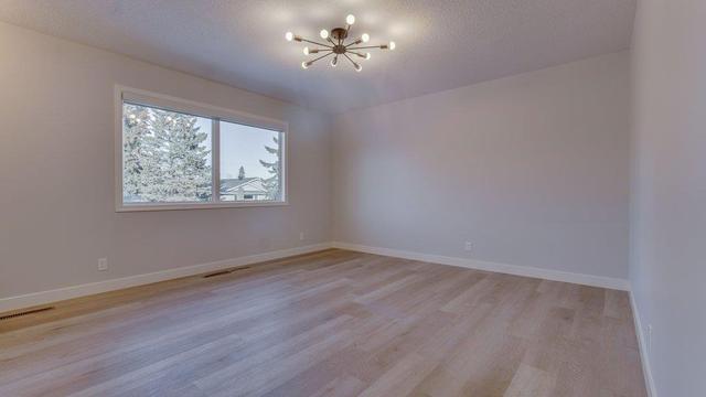 215 Tache Avenue Nw, House detached with 5 bedrooms, 2 bathrooms and 4 parking in Calgary AB | Image 19