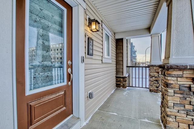 268 Carrington Way Nw, Home with 3 bedrooms, 2 bathrooms and 2 parking in Calgary AB | Image 1