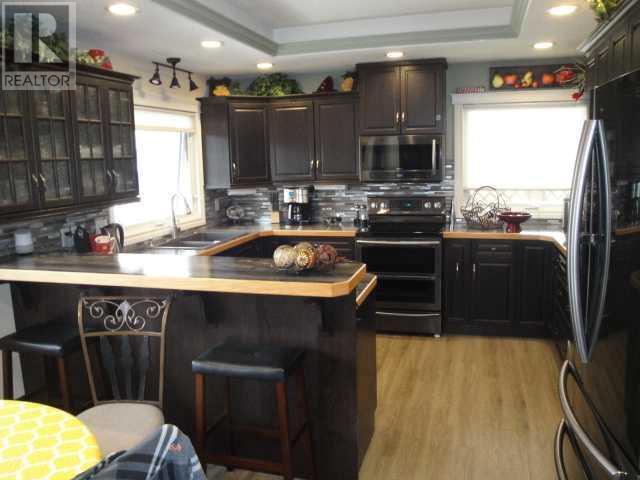 2006 14 Avenue S, House detached with 2 bedrooms, 2 bathrooms and 3 parking in Lethbridge AB | Image 5