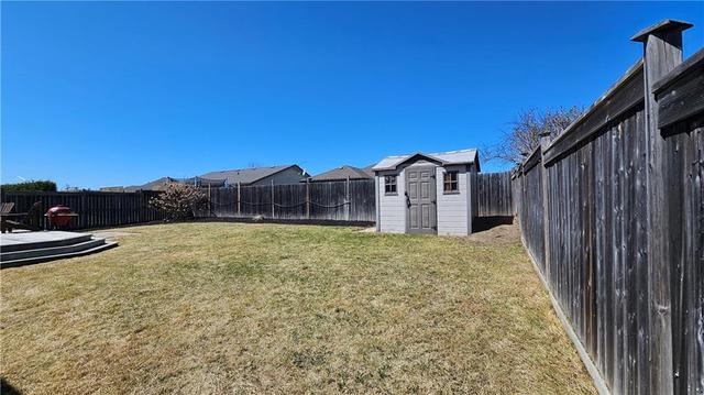 Large double garage plus a shed out back | Image 30