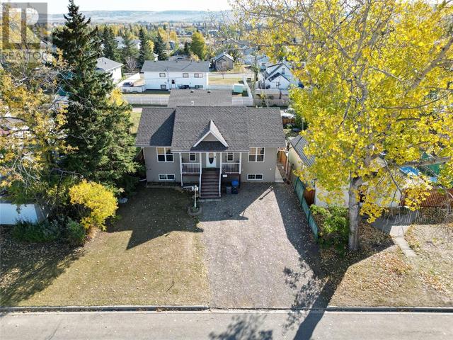 1437 104 Avenue, House detached with 4 bedrooms, 2 bathrooms and 6 parking in Dawson Creek BC | Image 4