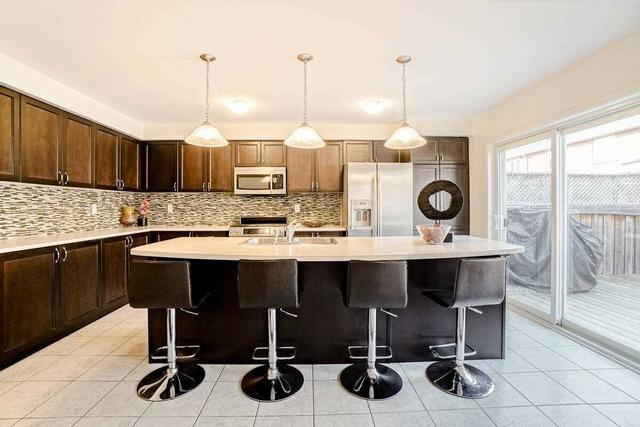 1011 Timmer Pl, House attached with 4 bedrooms, 3 bathrooms and 2 parking in Milton ON | Image 3