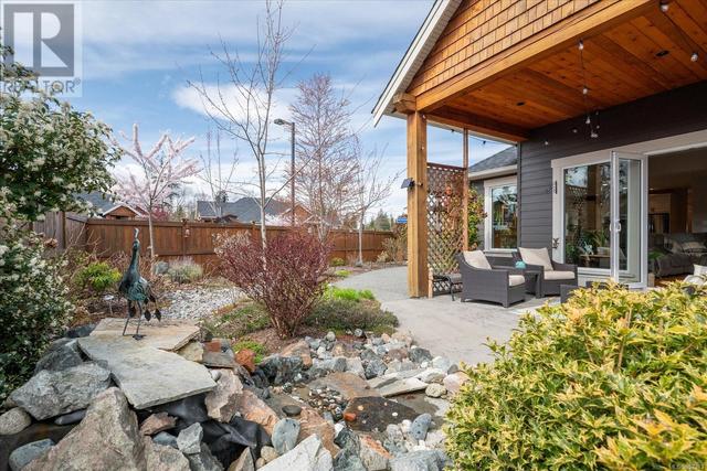 A back yard oasis with extensive landscaping, water feature ... all fenced for a high level of privacy | Image 9