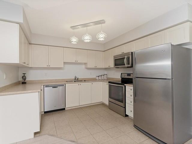 1 - 2444 Post Rd, Townhouse with 2 bedrooms, 2 bathrooms and 1 parking in Oakville ON | Image 3