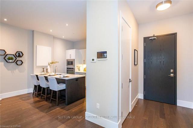 100 - 1705 Fiddlehead Pl, Condo with 1 bedrooms, 2 bathrooms and 2 parking in London ON | Image 2