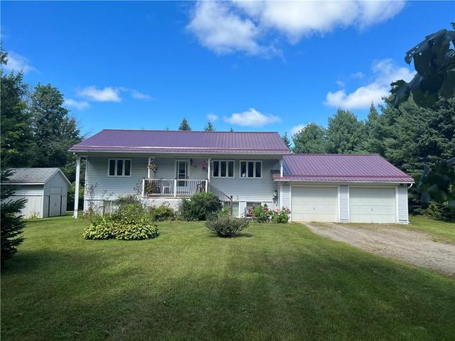 54 Strickland Road, House detached with 4 bedrooms, 2 bathrooms and 8 parking in Rideau Lakes ON | Card Image