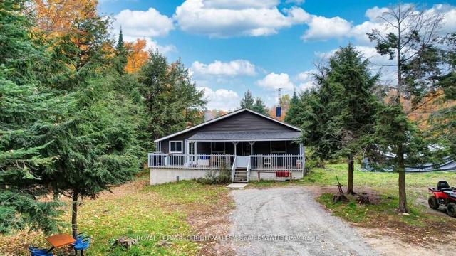 246 Hickey Tr, House detached with 2 bedrooms, 1 bathrooms and 8 parking in Hastings Highlands ON | Image 1