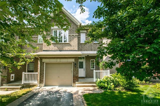 241 Tandalee Crescent, Townhouse with 2 bedrooms, 2 bathrooms and 3 parking in Ottawa ON | Image 1
