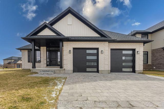 649 Tull St E, House detached with 4 bedrooms, 3 bathrooms and 6 parking in Strathroy Caradoc ON | Image 1