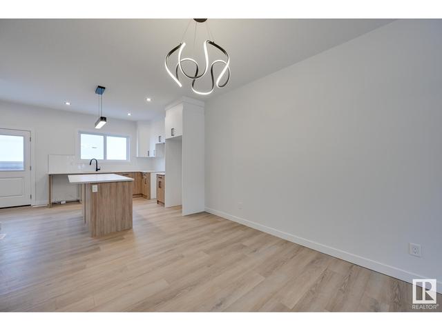170 Castilian Bv, House attached with 3 bedrooms, 2 bathrooms and 2 parking in Edmonton AB | Image 5