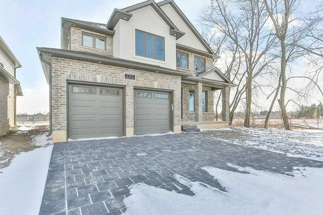 2323 Bakervilla St, House detached with 4 bedrooms, 3 bathrooms and 2 parking in London ON | Image 2