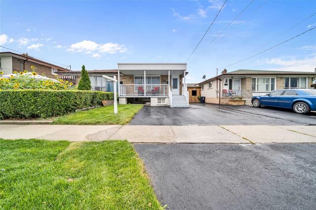 120 Cherrylawn Ave, House semidetached with 3 bedrooms, 3 bathrooms and 6 parking in Toronto ON | Image 1