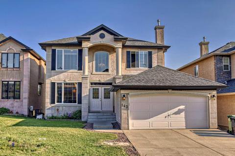 143 Sienna Park Heath Sw, House detached with 5 bedrooms, 3 bathrooms and 4 parking in Calgary AB | Card Image