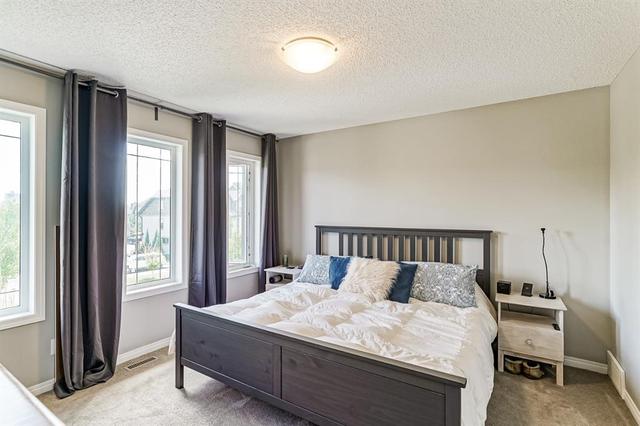 11 Belgian Lane, House attached with 3 bedrooms, 2 bathrooms and 4 parking in Cochrane AB | Image 19