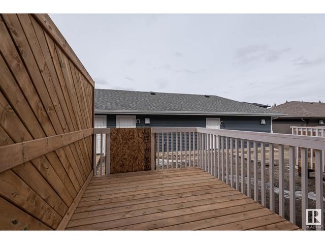 5702 Juchli Av Nw, House attached with 3 bedrooms, 3 bathrooms and null parking in Edmonton AB | Image 31