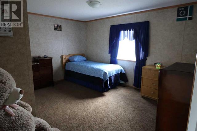 720 2 Street N, House other with 3 bedrooms, 2 bathrooms and 4 parking in Taber MD AB | Image 13