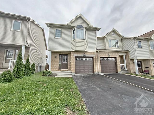 236 Rolling Meadow Crescent, Townhouse with 3 bedrooms, 3 bathrooms and 3 parking in Ottawa ON | Image 4