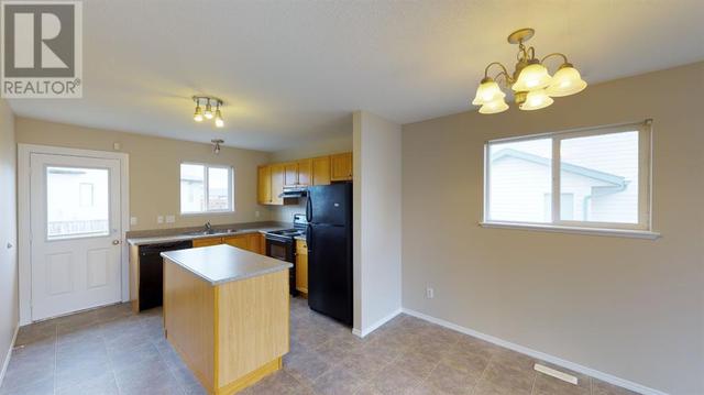 8206 114 Street, House semidetached with 3 bedrooms, 1 bathrooms and 2 parking in Grande Prairie AB | Image 19