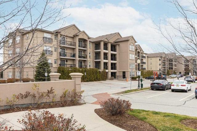 209 - 1360 Main St E, Condo with 2 bedrooms, 1 bathrooms and 2 parking in Milton ON | Image 1
