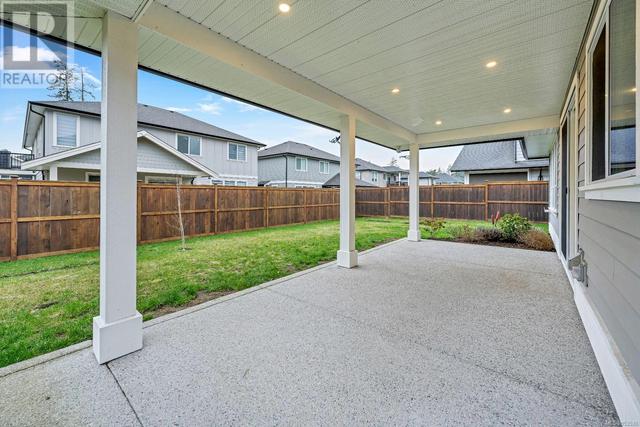covered rear patio perfect for entertaining or relaxing! | Image 33