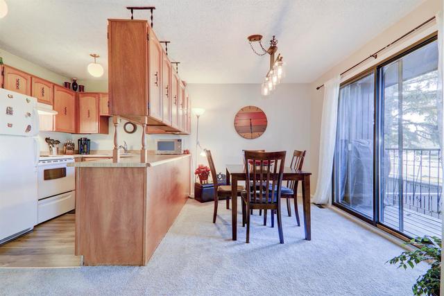21 - 2323 Oakmoor Drive Sw, Home with 2 bedrooms, 1 bathrooms and 2 parking in Calgary AB | Image 2