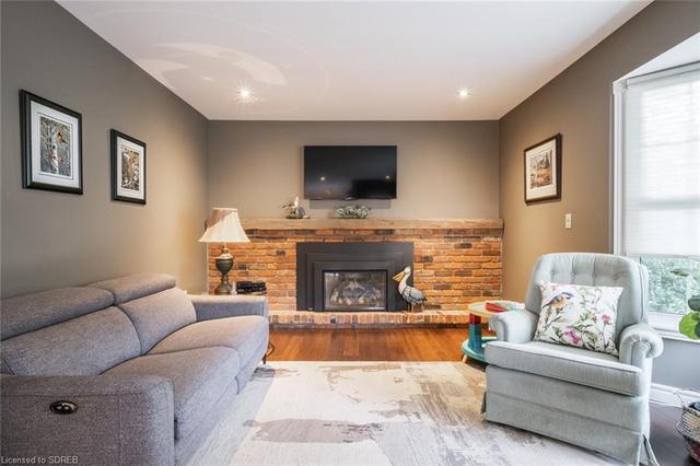 Cozy up next to the gas fireplace | Image 17