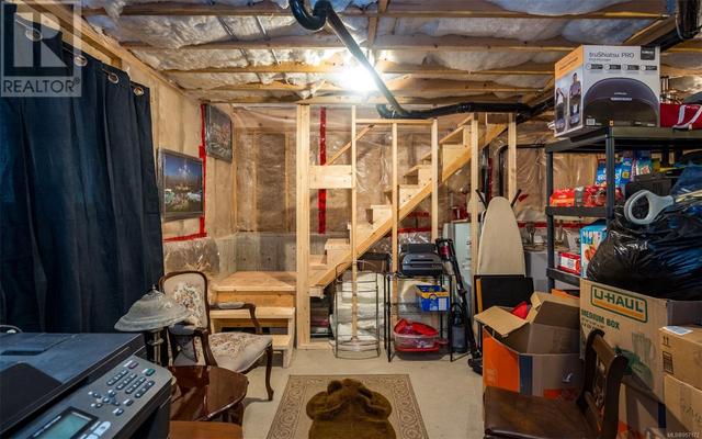 Huge over height crawl space with power, heat, window & access from inside the home or outdoors. | Image 19