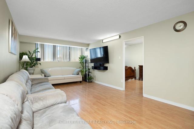 411 - 10 Tapscott Rd, Condo with 2 bedrooms, 2 bathrooms and 1 parking in Toronto ON | Image 4