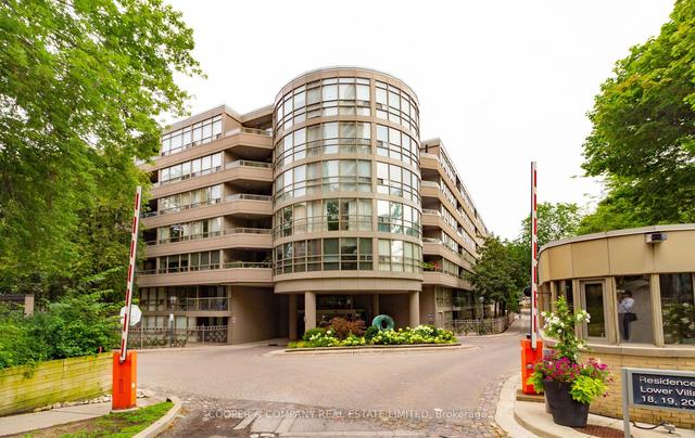 404 - 18 Lower Village Gate, Condo with 2 bedrooms, 2 bathrooms and 1 parking in Toronto ON | Image 1