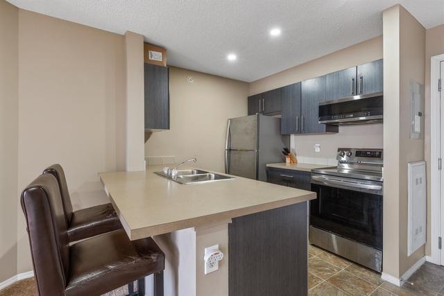 405 - 15 Saddlestone Way Ne, Condo with 2 bedrooms, 2 bathrooms and 1 parking in Calgary AB | Image 9